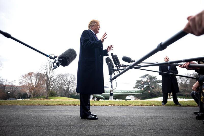 Donald Trump speaks to the media about Syria, Nancy Pelosi, and his proposed border wall as he departs the White House for Dover Air Force Base. EPA