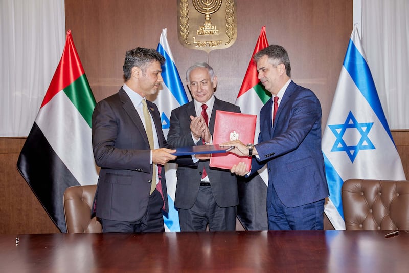 Mohamed Al Khaja, the UAE Ambassador to Israel, and Eli Cohen, Minister of Foreign Affairs of Israel, sign the agreement in the presence of Israeli Prime Minister Benjamin Netanyahu at the Prime Minister’s office in Jerusalem. Wam