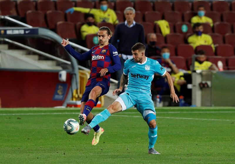 Barcelona's Antoine Griezmann battles for possession with Guido Carrillo of Leganes on June 16, 2020. Griezmann played the full 90 minutes but did not score.  Reuters