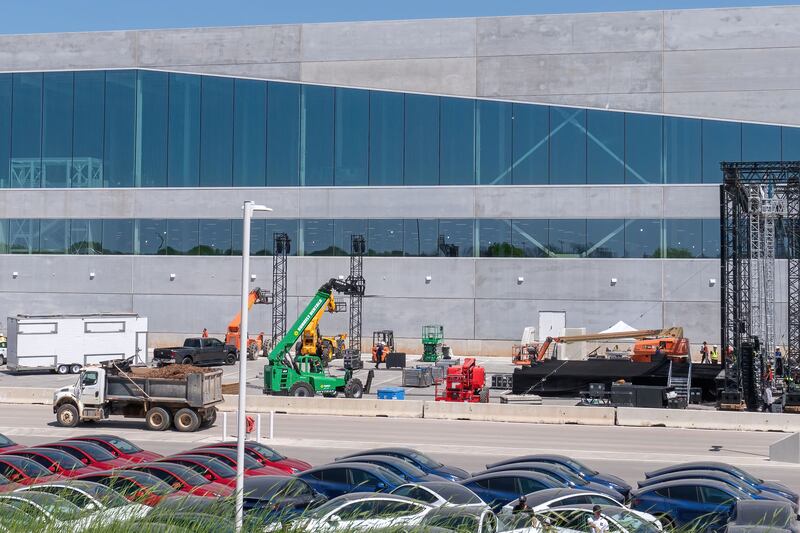 Workers set up for the grand opening party at the new Tesla Giga Texas plant in Austin, Texas. AFP