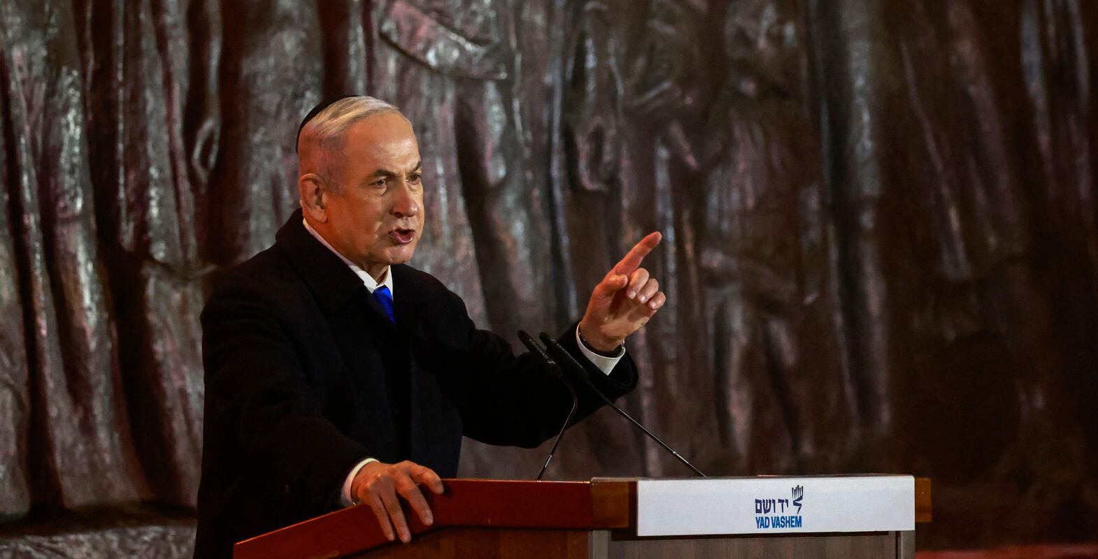 Israel's Prime Minister Benjamin Netanyahu speaks during a ceremony marking Holocaust Remembrance Day for the six million Jews killed during World War II, at the Yad Vashem Holocaust Memorial in Jerusalem on May 5, 2024.  (Photo by Menahem Kahana  /  AFP)