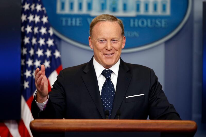 FILE - In this Tuesday, June 20, 2017, file photo, then-White House press secretary Sean Spicer smiles as he answers a question during a briefing at the White House,  in Washington. Former White House press secretary Spicer is working on a television interview show in which he banters with guests about a variety of topics. (AP Photo/Alex Brandon, File)