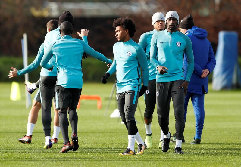 Chelsea players go through drills during training. John Sibley / Reuters