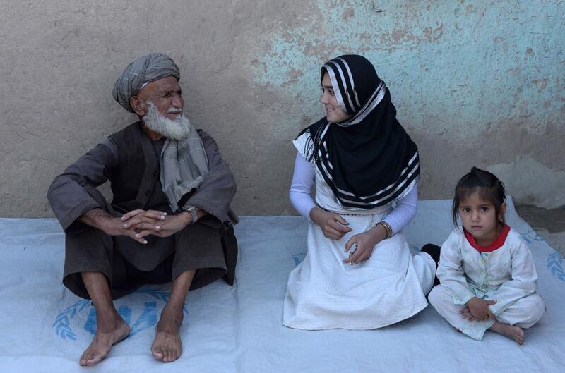 Aziza Rahimzada speaks with her father Jandad Rahimzada.