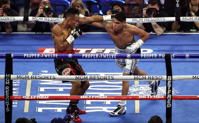 Jeo Santasima (left) and Emanuel Navarette during the World Boxing Organisation World Super Bantam Title bout at the MGM Grand, Las Vegas. PA wire