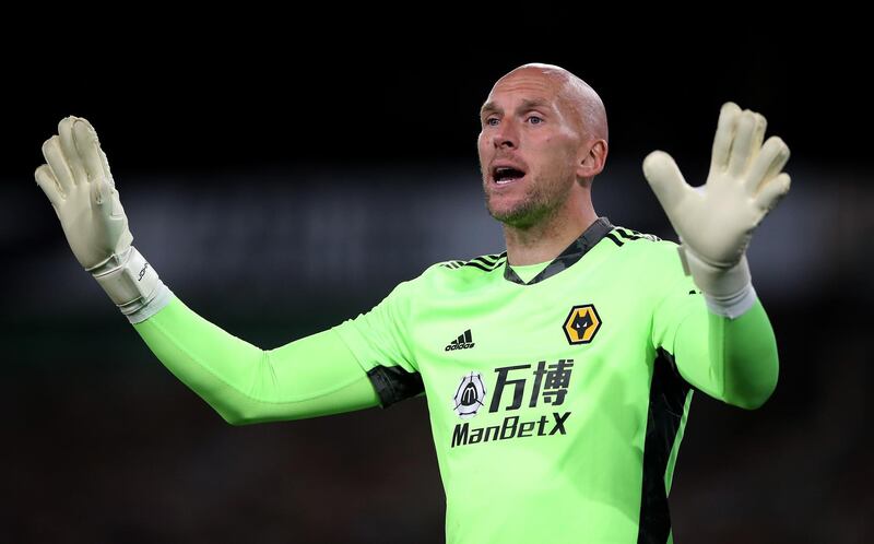 WOLVERHAMPTON, ENGLAND - SEPTEMBER 17: John Ruddy of Wolverhampton Wanderers reacts during the Carabao Cup second round match between Wolverhampton Wanderers and Stoke City at Molineux on September 17, 2020 in Wolverhampton, England. (Photo by Nick Potts - Pool/Getty Images)