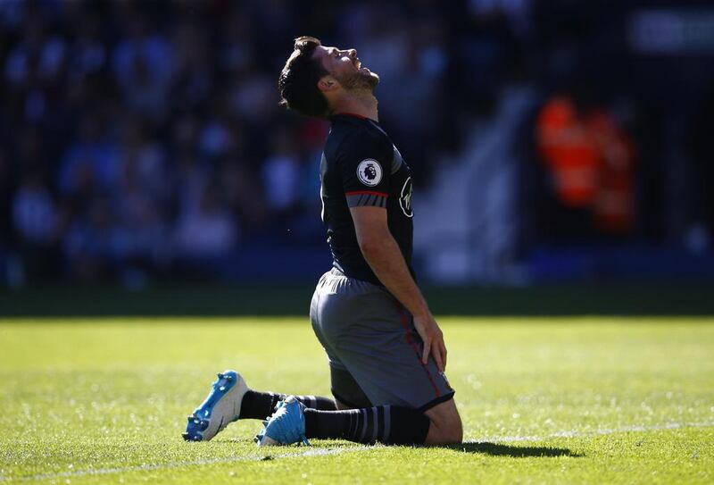 Southampton's Shane Long looks dejected against West Brom. Peter Cziborra / Reuters