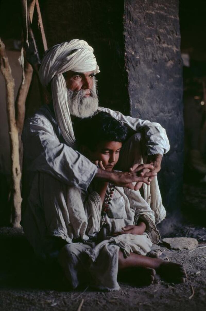 Father and son in Helmand province, 1980. Copyright ©Steve McCurry / Magnum Photos