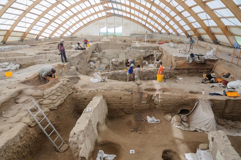 Researchers excavate the ruins of Catalhoyuk, a prehistoric settlement located in south-central Turkey that was inhabited from about 9,100 to 7,950 years ago, in Istanbul, Turkey. Reuters
