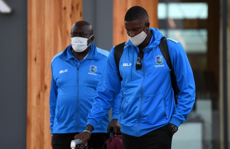 West Indies captain Jason Holder with coach Roddy Estwick arrive at Manchester Airport. Getty