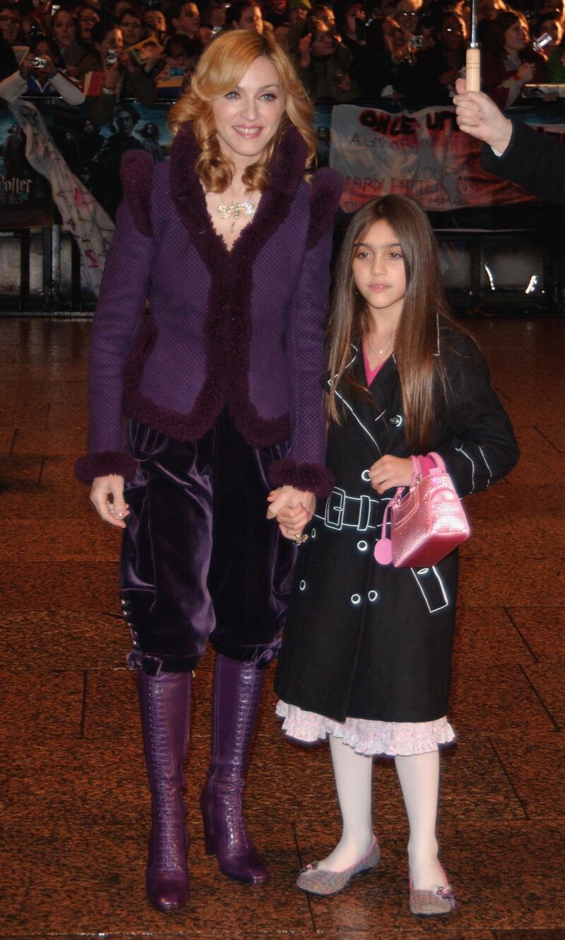 LONDON - NOVEMBER 06:  Singer Madonna and daughter Lourdes arrive at the World Premiere of "Harry Potter And The Goblet Of Fire" at the Odeon Leicester Square on November 6, 2005 in London, England.  The film is based on the fourth installment of author J.K. Rowling's novel series.  (Photo by Chris Harding/Getty Images)