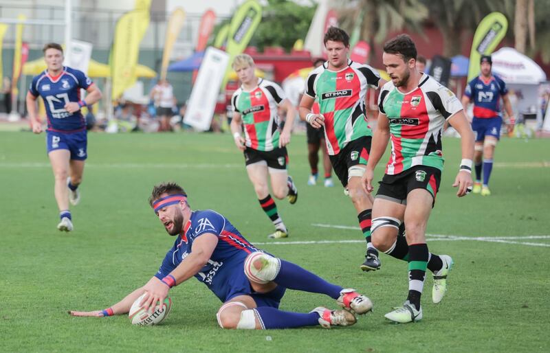 Dubai,UAE, April 7, 2017,  Abu Dhabi Harlequins (red and green) VS. Jebel Ali Dragons (Blue) Premiership final.
Victor Besa for The National
ID: 38294
Reporter:  Paul Radley
Sports *** Local Caption ***  VB_040717_sp-rugby-9.jpg