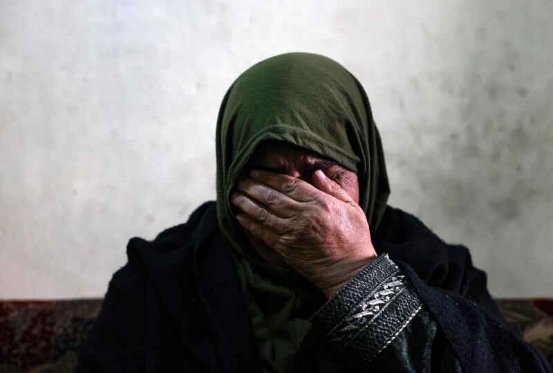 Ghufran, 56, the mother of Zakaria Al Adl, a member of ISIS killed in Iraq, wipes her tears during an interview in her house in Tripoli's Bab al-Tabbaneh neighbourhood. Dozens of young men from Tripoli, Lebanon's poorest city, are believed to have recently joined ISIS. All photos: AFP