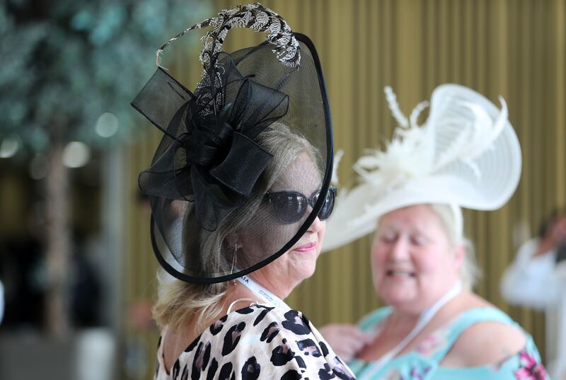 Women don their best fascinators for the Dubai World Cup. Pawan Singh / The National