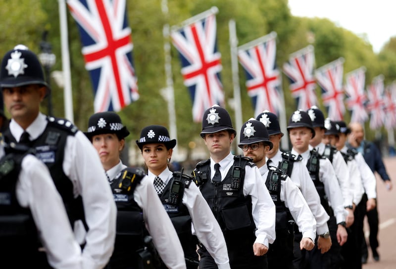 Police officers are seen on The Mall on the day of the state funeral and burial of Britain's Queen Elizabeth II. Reuters