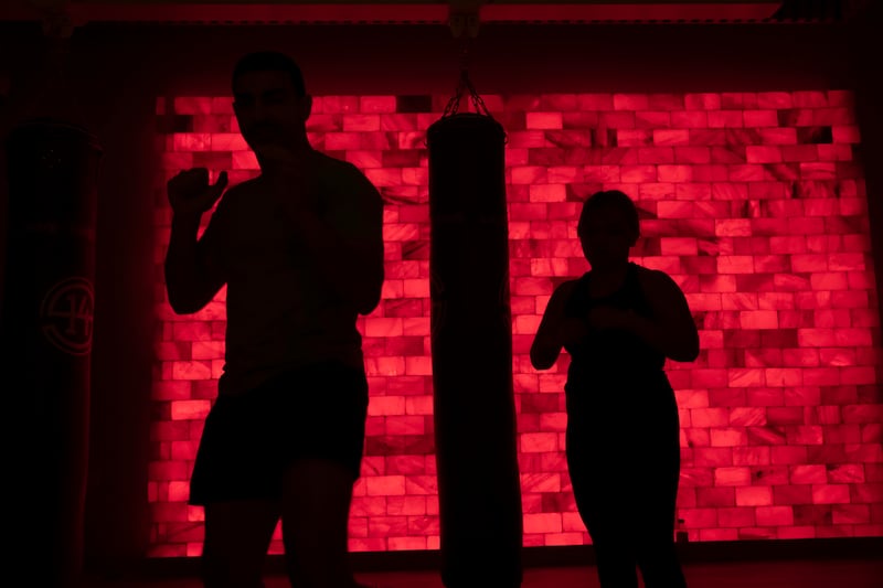 Studio 14 in Dubai has a Himalayan salt wall, which is beneficial when you're working out indoors in close proximity with others. Antonie Robertson / The National
