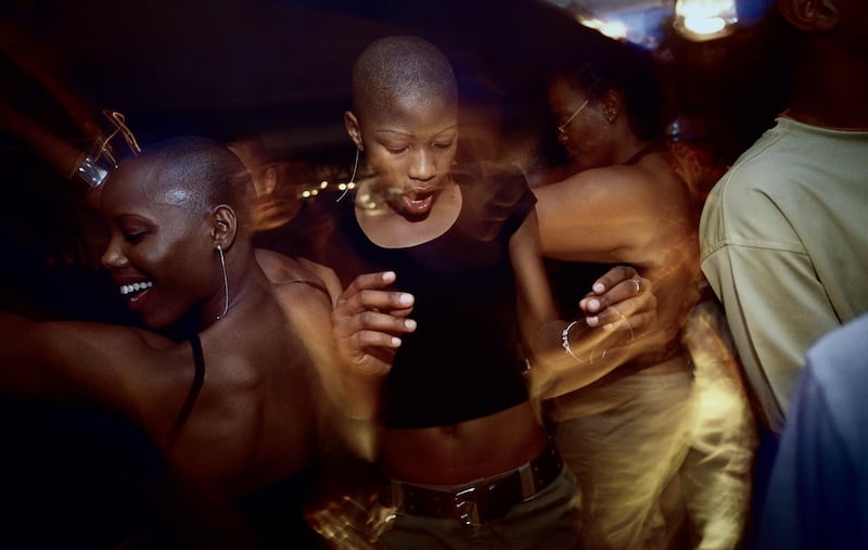 Unidentified young black yuppies dance and party at Who's Zoo, a popular nightclub in Fourways, an affluent suburb in Johannesburg, South Africa. After more than a decade democracy, a new black middleclass and elite is growing rapidly, and they have money to spend on houses, cars and entertainment. Getty Images