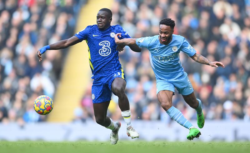 Raheem Sterling and Malang Sarr tussle for the ball. Getty Images