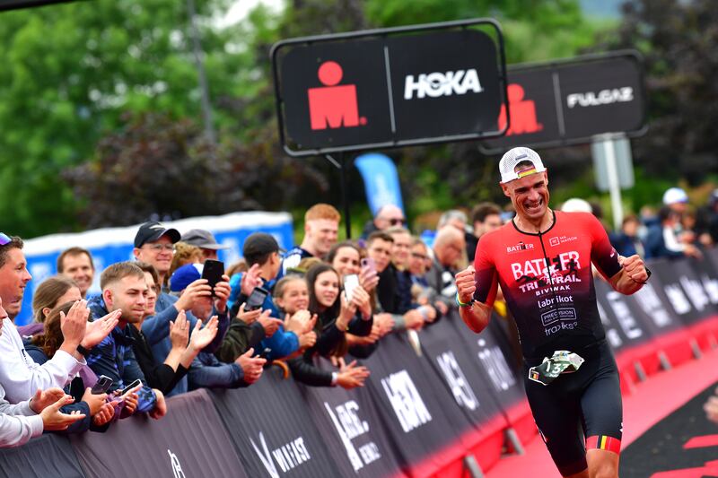 An athlete finishes the IRONMAN 70.3 Luxembourg. Getty Images 