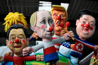 A carnival float shows Chinese President Xi Jinping, Russian President Vladimir Putin, US President Donald Trump and North Korean leader Kim Jong Un during a presentation of this year's canival floats of the carnival's committee in Cologne, western Germany, on February 18, 2020. AFP 