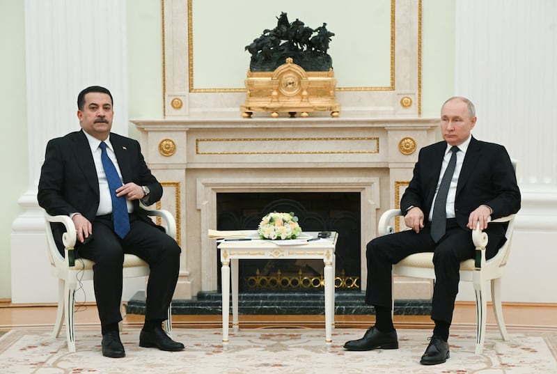 Russian President Vladimir Putin and Iraqi Prime Minister Mohammed Shia Al Sudani attend a meeting in Moscow on Tuesday. Photo: Sputnik