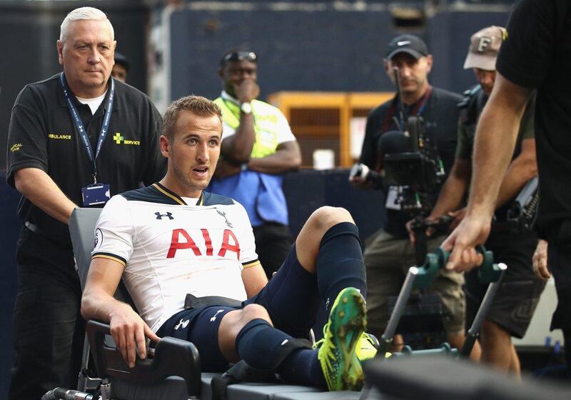 Harry Kane of Tottenham Hotspur is put onto a stretcher after coming off injured during the Premier League match against Sunderland. Julian Finney / Getty Images