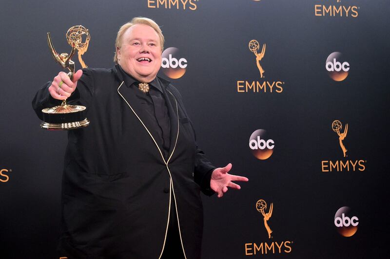 Louie Anderson poses with his Emmy Award in Los Angeles, California. AFP