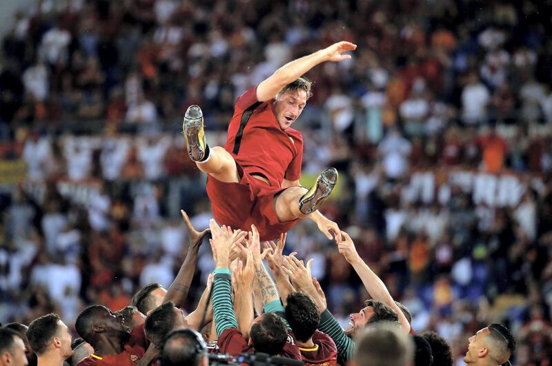 Roma's Francesco Totti is thrown into the air by team-mates after his last game during the Serie A match between AS Roma and Genoa at Stadio Olimpico, Rome, Italy, May 28, 2017. Reuter/Stefano Rellandini/File Photo  SEARCH "POY SPORT" FOR THIS STORY. SEARCH "REUTERS POY" FOR ALL BEST OF 2017 PACKAGES.    TPX IMAGES OF THE DAY