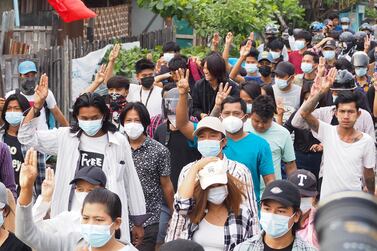 Demonstrators march during an anti-military coup protest in Mandalay, Myanmar, 09 April 2021. EPA