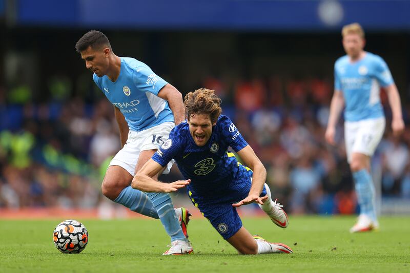 Rodrigo of Manchester City battles for possession with Chelsea's with Marcos Alonso. Getty