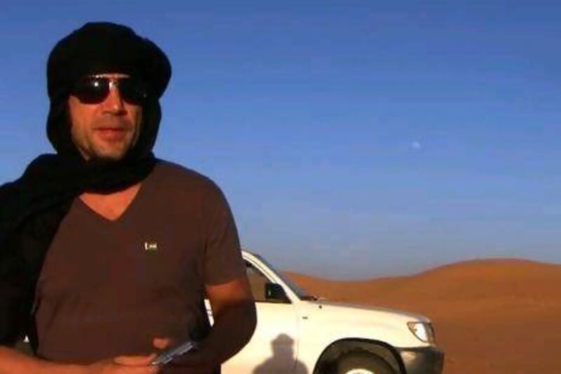 The actor Javier Bardem, who worked with the director Alvaro Longoria, in the desert during filming of Sons of the Clouds.