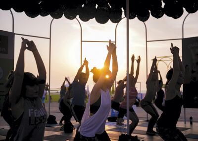 DUBAI, UNITED ARAB EMIRATES. 18 OCTOBER 2019. 
Yoga at Kite Beach Fitness Village.

The city launches the third edition of the Dubai Fitness Challenge (DFC) today with wide range of activities across the city that will be accessible to the entire Dubai community.   Here, Kites Beach is converted into a dedicated fitness village with different zones for free outdoor activities.

(Photo: Reem Mohammed/The National)

Reporter:
Section: