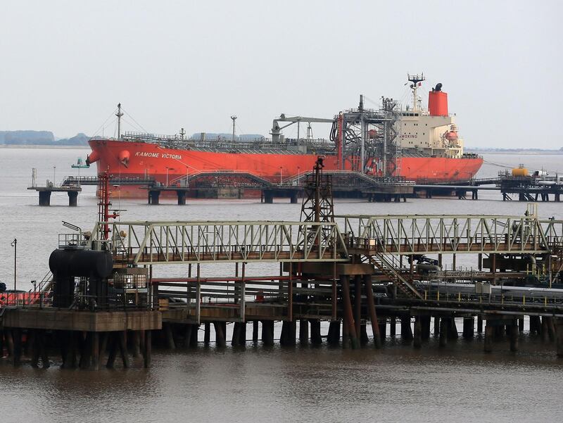 The oil products tanker Kamome Victoria is seen at the Port of Immingham operated by Associated British Ports (ABP) on the south bank of the Humber Estuary, eastern England, on October 5, 2018.  Brexit has brought hope to the windswept docks of the Humber River, a key goods gateway in northeast England where tens of millions of pounds are being invested to prepare for a potential increase in shipping. Associated British Ports (ABP), which owns four Humberside facilities including vast Immingham complex, is spending big to attract new business, raising hopes for a return of the area's former industrial glory. / AFP / LINDSEY PARNABY
