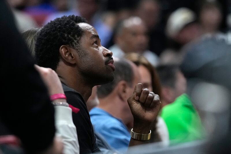 Actor Jay Ellis watches during the game between Miami Heat and Brooklyn Nets. AP