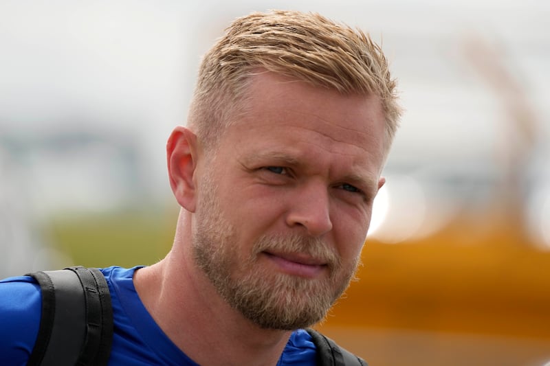 Haas driver Kevin Magnussen arrives for the British Grand Prix. AP