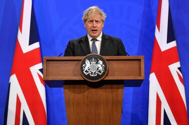Britain's Prime Minister Boris Johnson gives an update on the coronavirus Covid-19 pandemic during a virtual press conference inside the new Downing Street Briefing Room. AFP