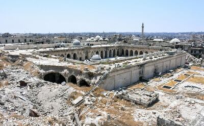 A picture taken on July 22, 2017 in the northern Syrian city of Aleppo, which was recaptured by government forces in December 2016, shows a general view of the destruction at the site of the ancient Great Umayyad Mosque in the old city. / AFP PHOTO / George OURFALIAN