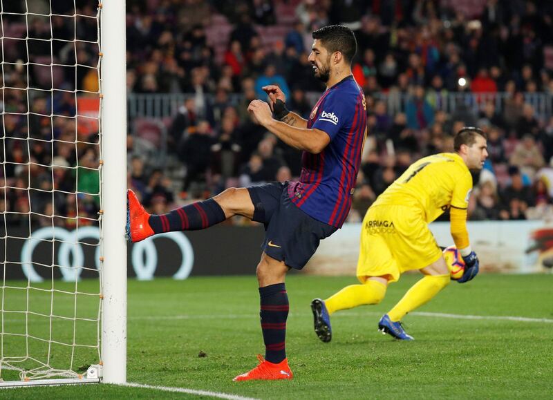 Luis Suarez kicks the post in frustration. Reuters