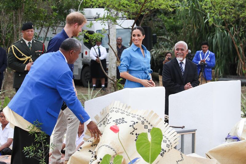 Prince Harry, Duke of Sussex and Meghan, Duchess of Sussex unveil The Queen's Commonwealth Canopy at Tupou College.  Getty Images