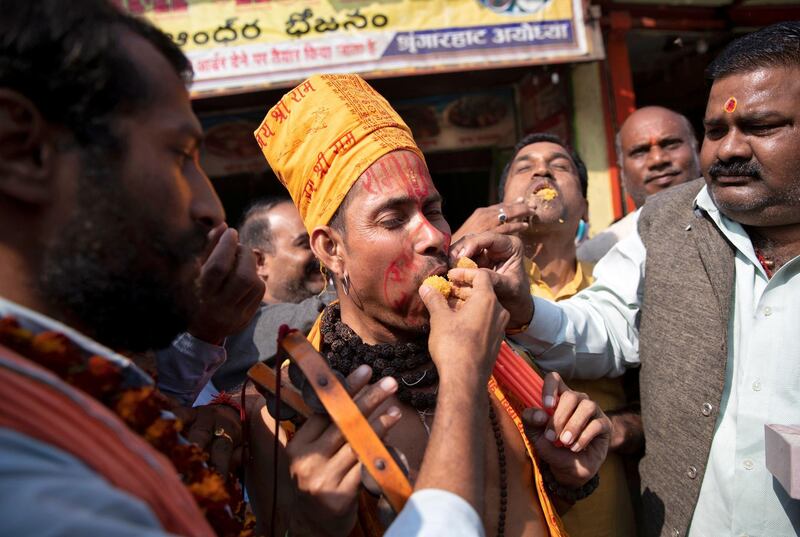 Hindus celebrate in Ayodhya after the Supreme Court's verdict on the disputed religious site in the north Indian city. Reuters