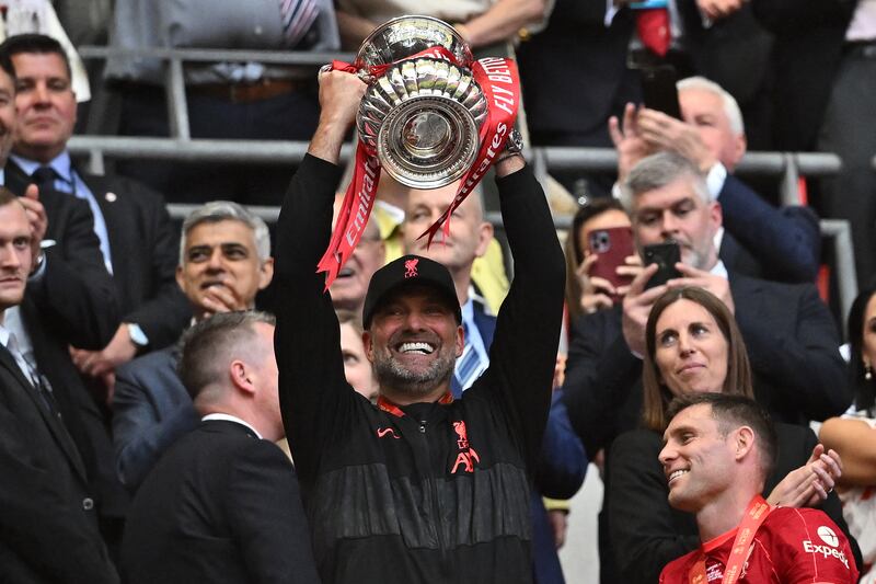 Liverpool manager Jurgen Klopp celebrates after winning the FA Cup final at the Wembley Stadium on May 14, 2022. AFP