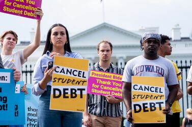 Activists gather to rally in support of cancelling student debt, in front of the White House in Washington, DC, on August 25, 2022.  - Biden announced on August 24, 2022, that most US university graduates still trying to pay off student loans will get $10,000 of relief to address a decades-old headache of massive educational debt across the country.  (Photo by Stefani Reynolds  /  AFP)