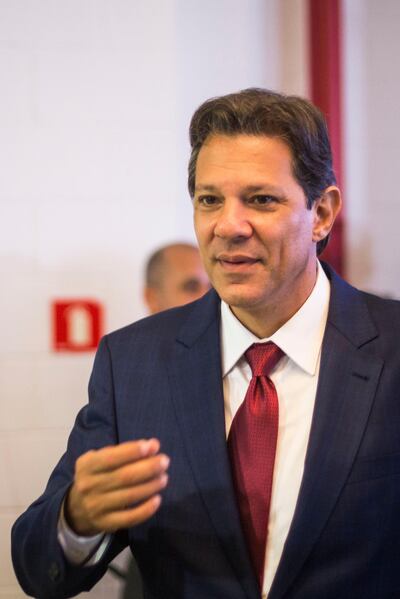 Brazilian presidential candidate Fernando Haddad (PT) arrives to the press conference after the last presidential debate ahead of the October 7 general election, at Globo television network headquarters in Rio de Janeiro, Brazil on October 4, 2018.  Right-wing frontrunner Jair Bolsonaro, who was stabbed on September 6 during a campaign rally in the southern state of Minas Gerais, is absent due to medical reasons.  / AFP / Daniel RAMALHO
