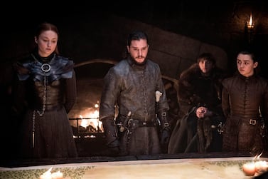 Sophie Turner, Kit Harington, Isaac Hempstead Wright and Maisie Williams in a scene from 'Game of Thrones.' Fans got a taste of the modern world when eagle-eyed viewers spotted a takeout coffee cup on the table during a celebration in which the actors drank from goblets and horns. Courtesy HBO 