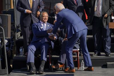 US President Joe Biden greets Jesse Jackson at an event near the Edmund Pettus Bridge in Selma, Alabama, US, on Sunday, March 5, 2023, marking the 58th anniversary of "Bloody Sunday," when White state troopers attacked voting-rights demonstrators on the Edmund Pettus Bridge. Bloomberg 