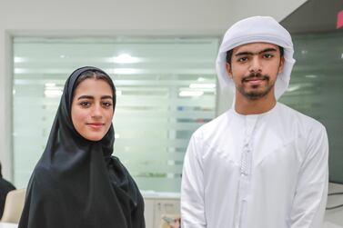 Meera Al Blooshi, 17, and Abdullah Al Hefeiti, benefited both academically and personally from their trips overseas as part of the Ministry of Education's Ambassador programme. Victor Besa/The National
