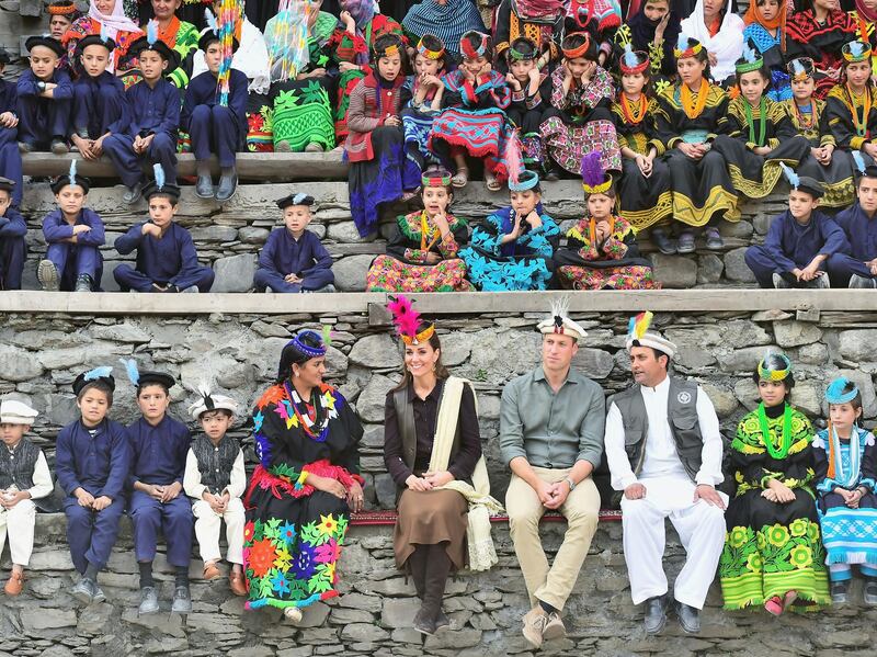Britain's Prince William and Catherine, Duchess of Cambridge visit a settlement of the Kalash people in Chitral, Pakistan.  Reuters