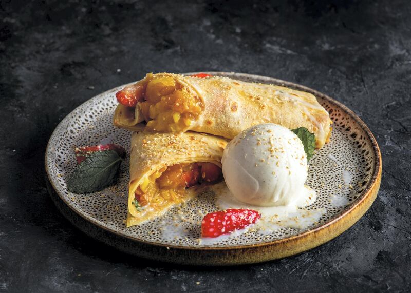 A dessert of slow-roasted pineapple, wrapped in a crepe, available at Vox Gold. Courtesy Vox Cinemas