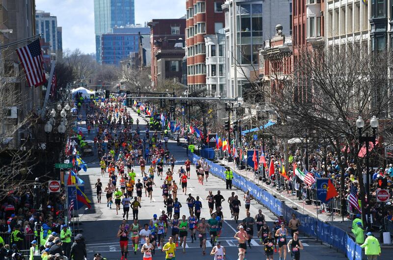 Runners approach the finish line on Boylston Street during the 123rd Boston Marathon in Boston, Massachusetts, U.S., April 15, 2019. REUTERS/Gretchen Ertl