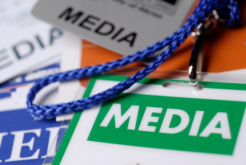 Stock Photo of media passes. 